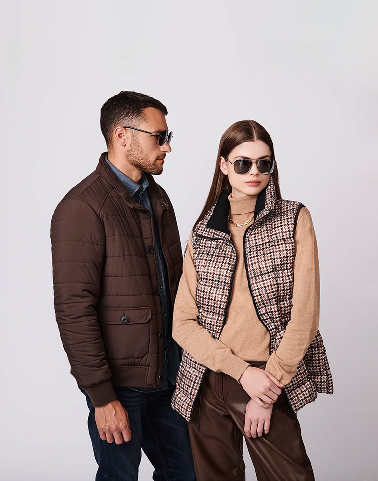 Woman and man in jackets, Bernardo brand